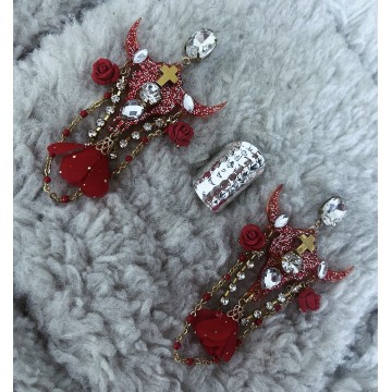 Boucles d'oreilles buffle rouge.