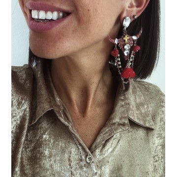 Boucles d'oreilles buffle rouge.