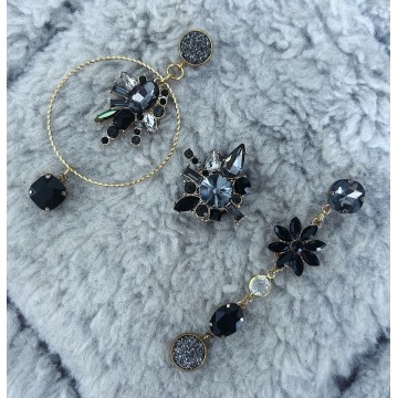 Boucles d'oreilles reflets noir doré asymétrique.