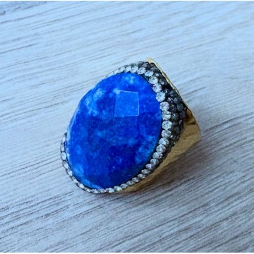 Bague réglable multi strass pierre bleue.